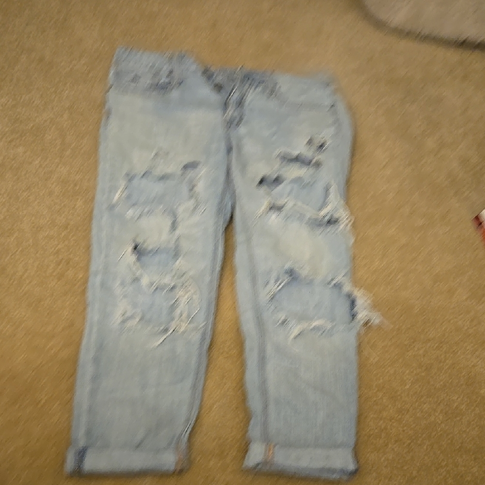 Distressed Light Blue Jeans